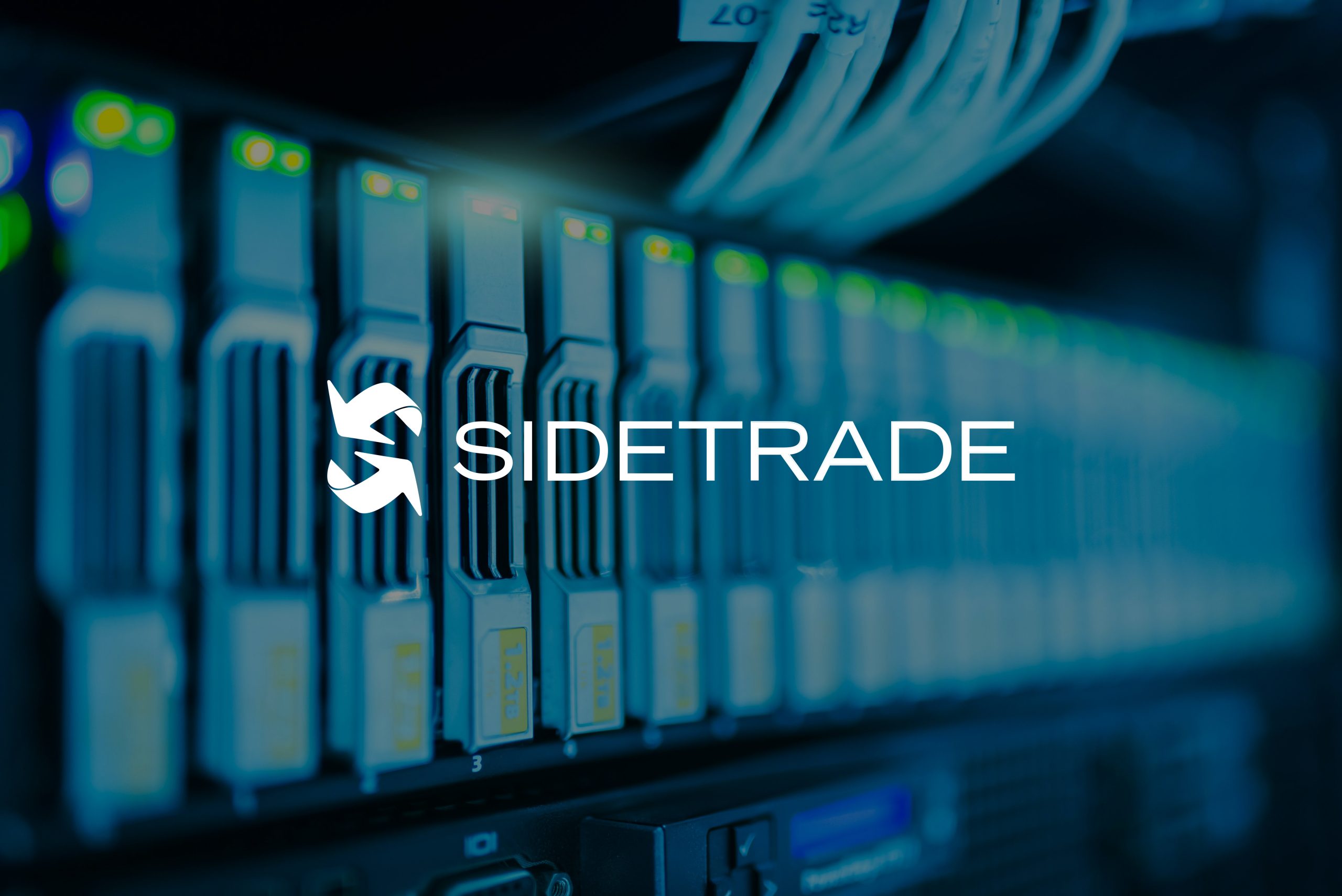 Computer components under a blue light with the Side Trade logo on top