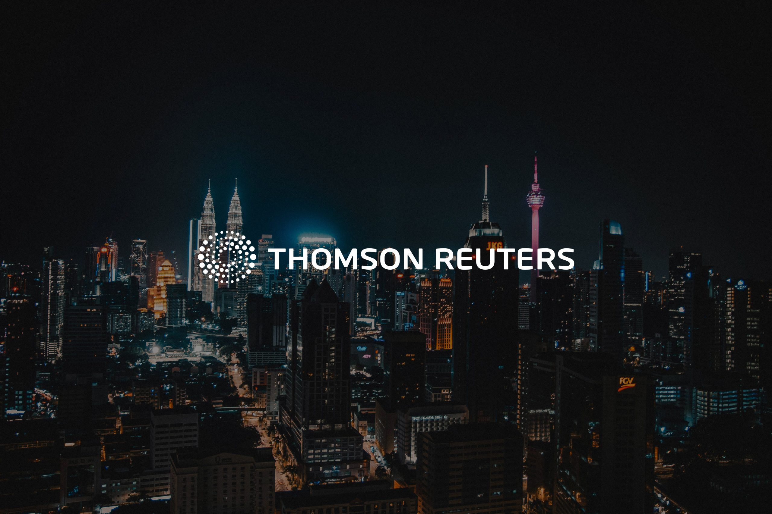 A night time city skyline with the logo Thomson Reuters displayed on top